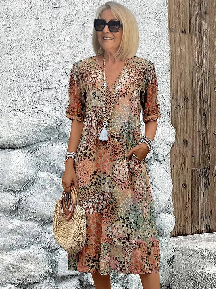 Damen Sommerkleid | V-Ausschnitt mit Muster und Knielänge
